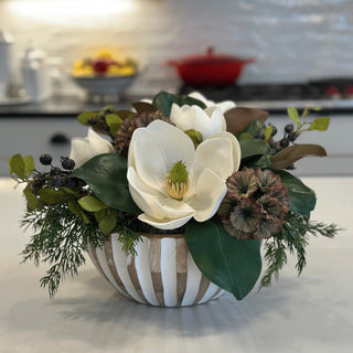 j ellers design faux white magnolias with blueberries and greens in wood bowl