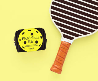 Pinch Provisions Pickleball Kit and a pickleball paddle