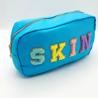 The Spotted Zebras - Cosmetic or Toiletry Bag with Varsity Letter Patches: Light Blue with SKIN